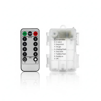Battery operated micro fairy lights remote control and battery box front view with mode settings